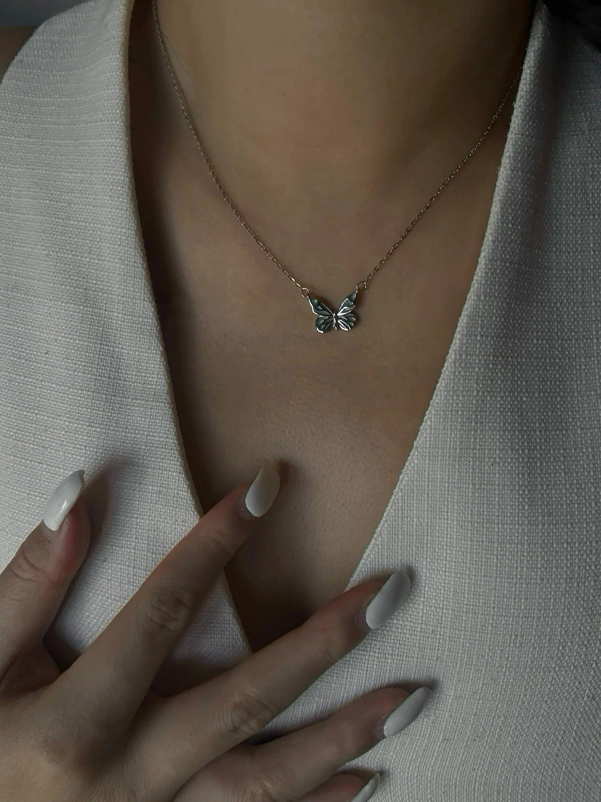 AquaGlow Butterfly Necklace