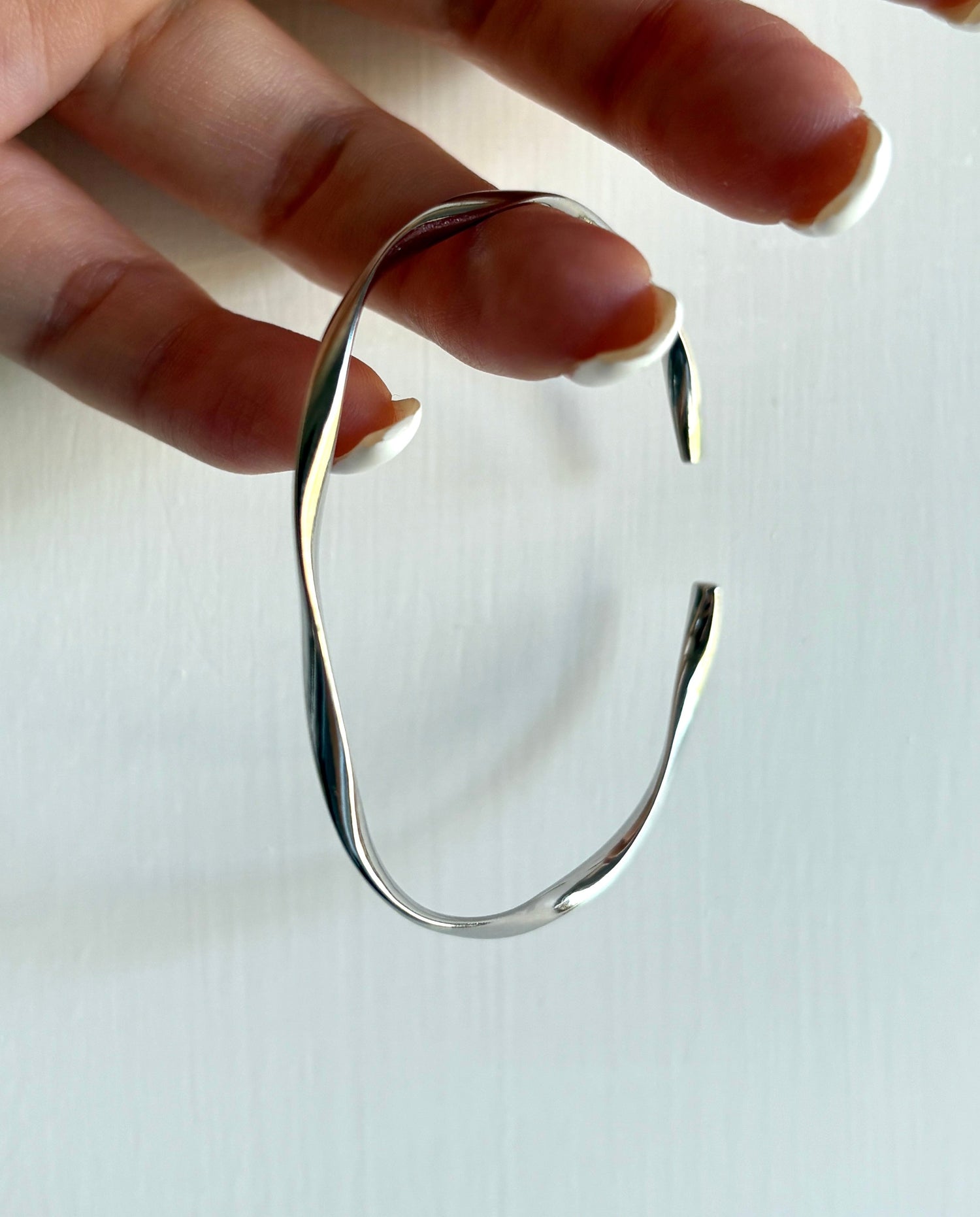 Fluid Wave Twist Bangle